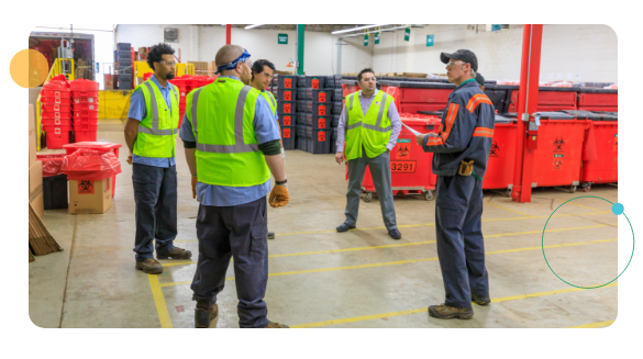 Employees sitting around a table